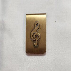 Vintage Brass Money Clip with a treble clef design